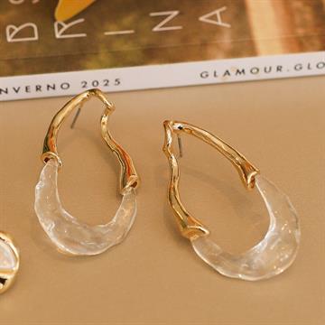 BRINCO ORGÂNICO DOURADO TRANSPARENTE