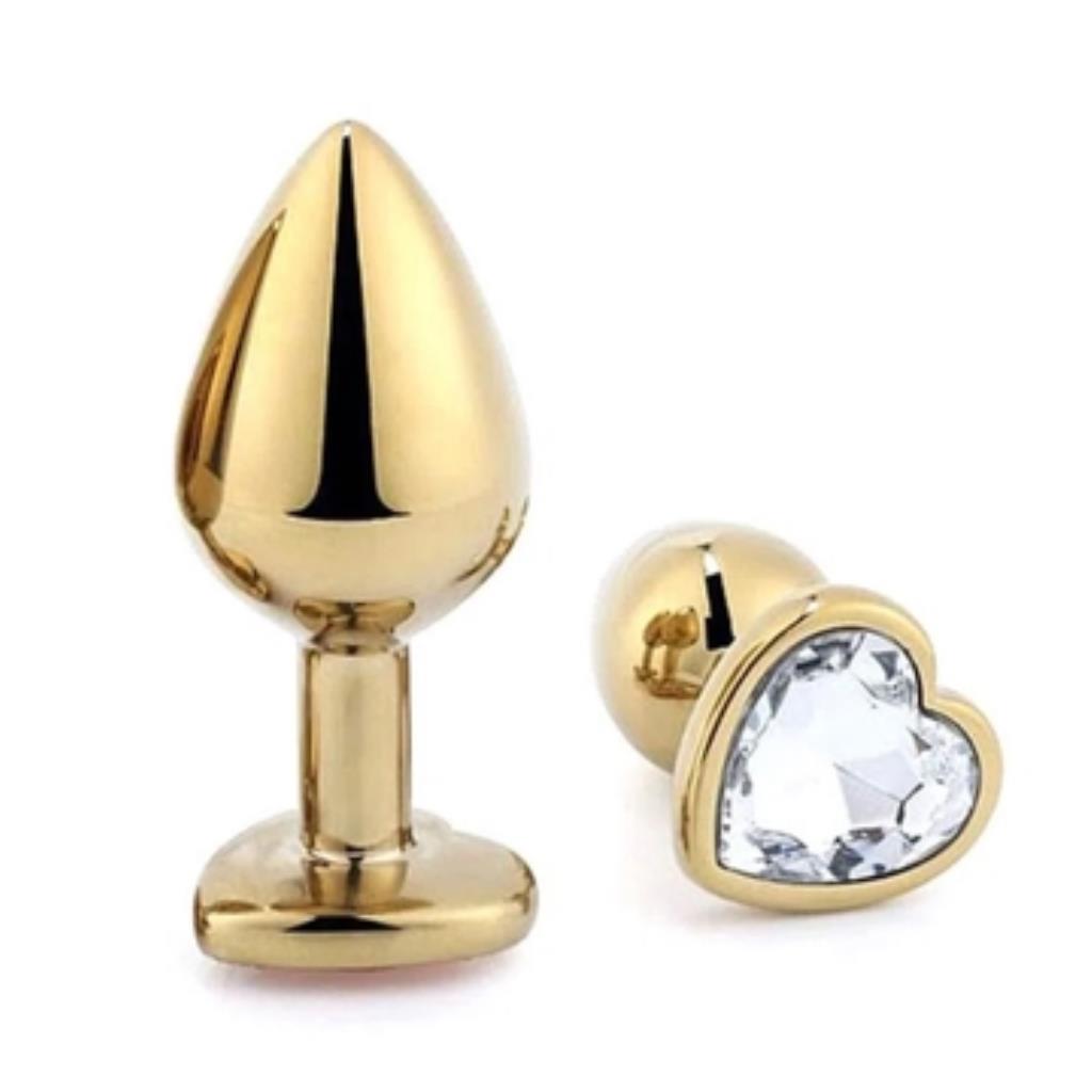 PLUG ANAL DE CORACAO EM ACO - DOURADO COM PEDRA 7 X 2,8 CM - TAMANHO P - TRANSPARENTE; / 7055