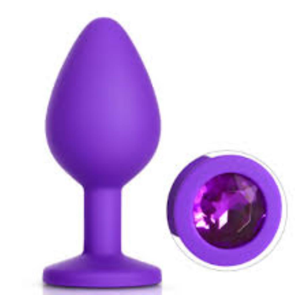 PLUG EM SILICONE 7,2 x 3,2 CM COM PEDRA ROXO PEQUENO
